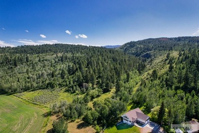 Set beneath the towering Big Hole Mountains, this 292-acre - photo 5