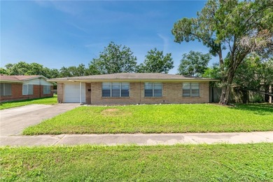 Welcome home to this charming 3-bedroom, 2-bath brick residence - photo 1