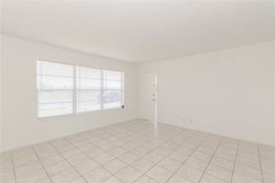 Welcome home to this charming 3-bedroom, 2-bath brick residence - photo 2
