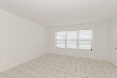 Welcome home to this charming 3-bedroom, 2-bath brick residence - photo 3