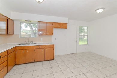 Welcome home to this charming 3-bedroom, 2-bath brick residence - photo 6