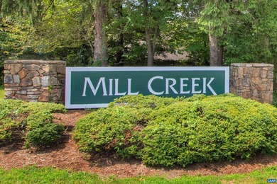 Nestled on a quiet cul-de-sac in Mill Creek Village, this - photo 4