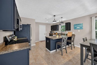 This 3-bedroom ranch offers a spacious, functional layout with a - photo 11
