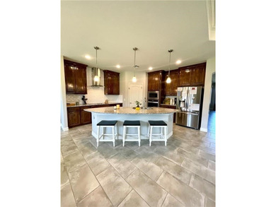 This Exquisite 4 Bed 3 full bath OPEN FLOOR PLAN is perfect to - photo 4
