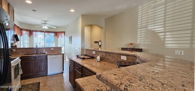 This single level home is tucked quietly into the end of a