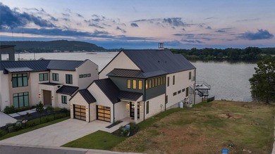 Welcome to 144 Riverfront Lane in Kingsland, where luxury lake - photo 1