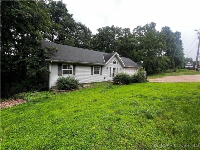 Lake Home For Sale in Sunrise Beach, Missouri