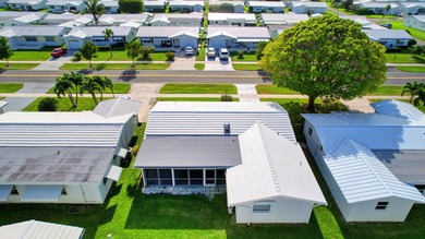 Welcome to this charming single-story home in Palm Beach - photo 14
