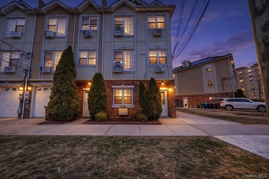 This beautifully maintained legal 3-family semi-detached home - photo 2