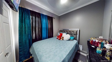 This beautifully maintained legal 3-family semi-detached home - photo 7