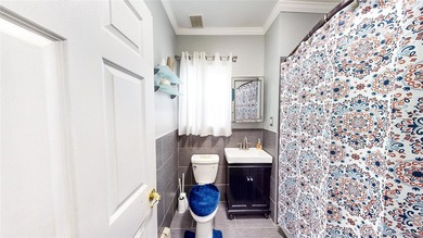 This beautifully maintained legal 3-family semi-detached home - photo 8