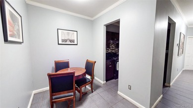 This beautifully maintained legal 3-family semi-detached home - photo 9