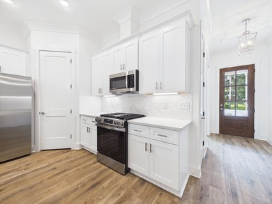 This spacious single-story residence offers a seamless blend of - photo 15