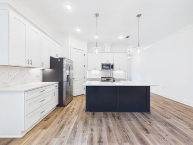 This spacious single-story residence offers a seamless blend of - photo 17