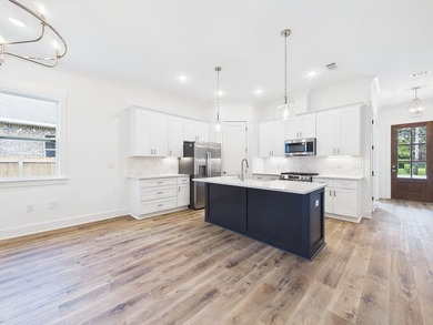 This spacious single-story residence offers a seamless blend of - photo 18