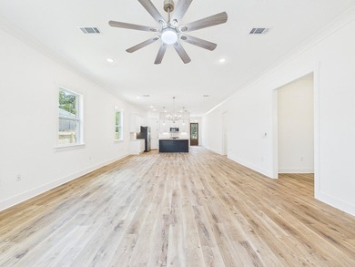 This spacious single-story residence offers a seamless blend of - photo 20