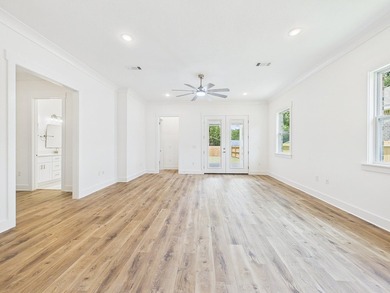 This spacious single-story residence offers a seamless blend of - photo 33