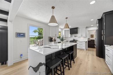 Classic brick ranch meets modern luxury in the heart of Osage - photo 18