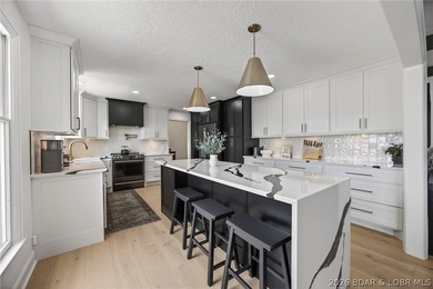 Classic brick ranch meets modern luxury in the heart of Osage - photo 19