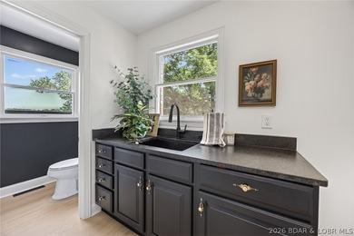Classic brick ranch meets modern luxury in the heart of Osage - photo 24