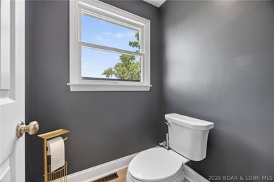 Classic brick ranch meets modern luxury in the heart of Osage - photo 25