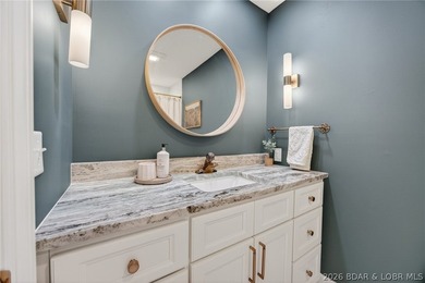 Classic brick ranch meets modern luxury in the heart of Osage - photo 36