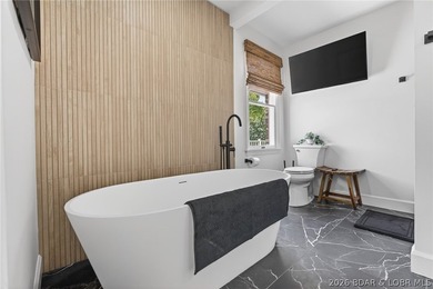 Classic brick ranch meets modern luxury in the heart of Osage - photo 42