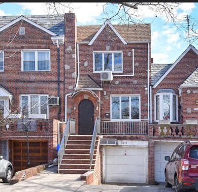 Located just minutes from Marine Park, this 1-family brick - photo 1