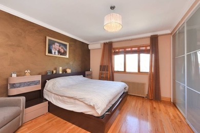 Located just minutes from Marine Park, this 1-family brick - photo 4