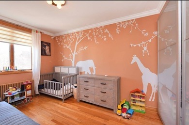 Located just minutes from Marine Park, this 1-family brick - photo 5