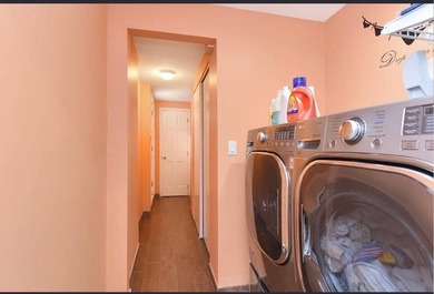 Located just minutes from Marine Park, this 1-family brick - photo 8