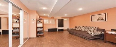 Located just minutes from Marine Park, this 1-family brick - photo 9