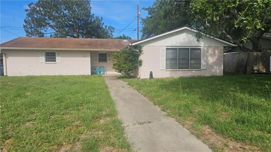 Charming three-bedroom brick home with a brand-new roof in 2025 - photo 1