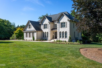 Classic elegance meets refined modern living in this exceptional - photo 5