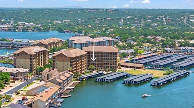 Set against the sparkling waters of Lake LBJ, this turn-key - photo 1