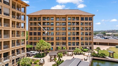 Set against the sparkling waters of Lake LBJ, this turn-key - photo 2
