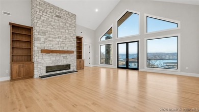 Where LAKE LIVING meets LASTING LUXURY. Sweeping panoramic views - photo 13