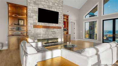 Where LAKE LIVING meets LASTING LUXURY. Sweeping panoramic views - photo 16
