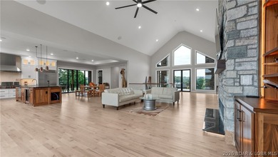 Where LAKE LIVING meets LASTING LUXURY. Sweeping panoramic views - photo 19
