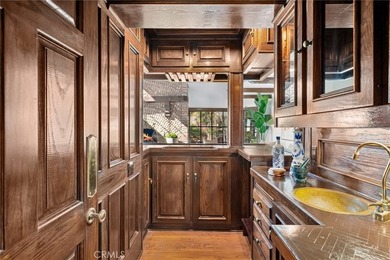 Perched above the Pacific Ocean, this rare Laguna Beach estate - photo 9