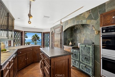 Perched above the Pacific Ocean, this rare Laguna Beach estate - photo 10