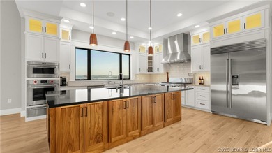 Where LAKE LIVING meets LASTING LUXURY. Sweeping panoramic views - photo 21