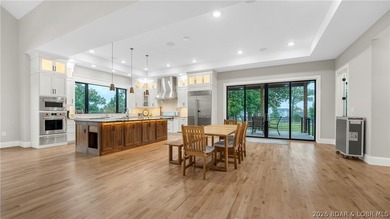 Where LAKE LIVING meets LASTING LUXURY. Sweeping panoramic views - photo 25