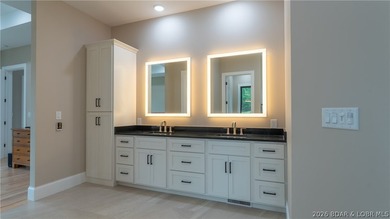 Where LAKE LIVING meets LASTING LUXURY. Sweeping panoramic views - photo 28