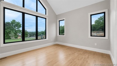 Where LAKE LIVING meets LASTING LUXURY. Sweeping panoramic views - photo 30