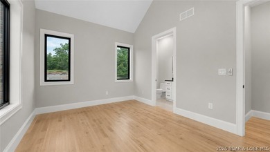 Where LAKE LIVING meets LASTING LUXURY. Sweeping panoramic views - photo 31