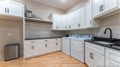 Where LAKE LIVING meets LASTING LUXURY. Sweeping panoramic views - photo 37