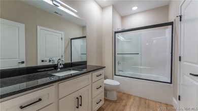 Where LAKE LIVING meets LASTING LUXURY. Sweeping panoramic views - photo 48