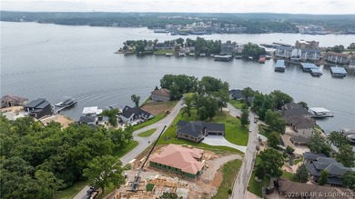 Where LAKE LIVING meets LASTING LUXURY. Sweeping panoramic views - photo 53