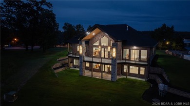 Where LAKE LIVING meets LASTING LUXURY. Sweeping panoramic views - photo 57